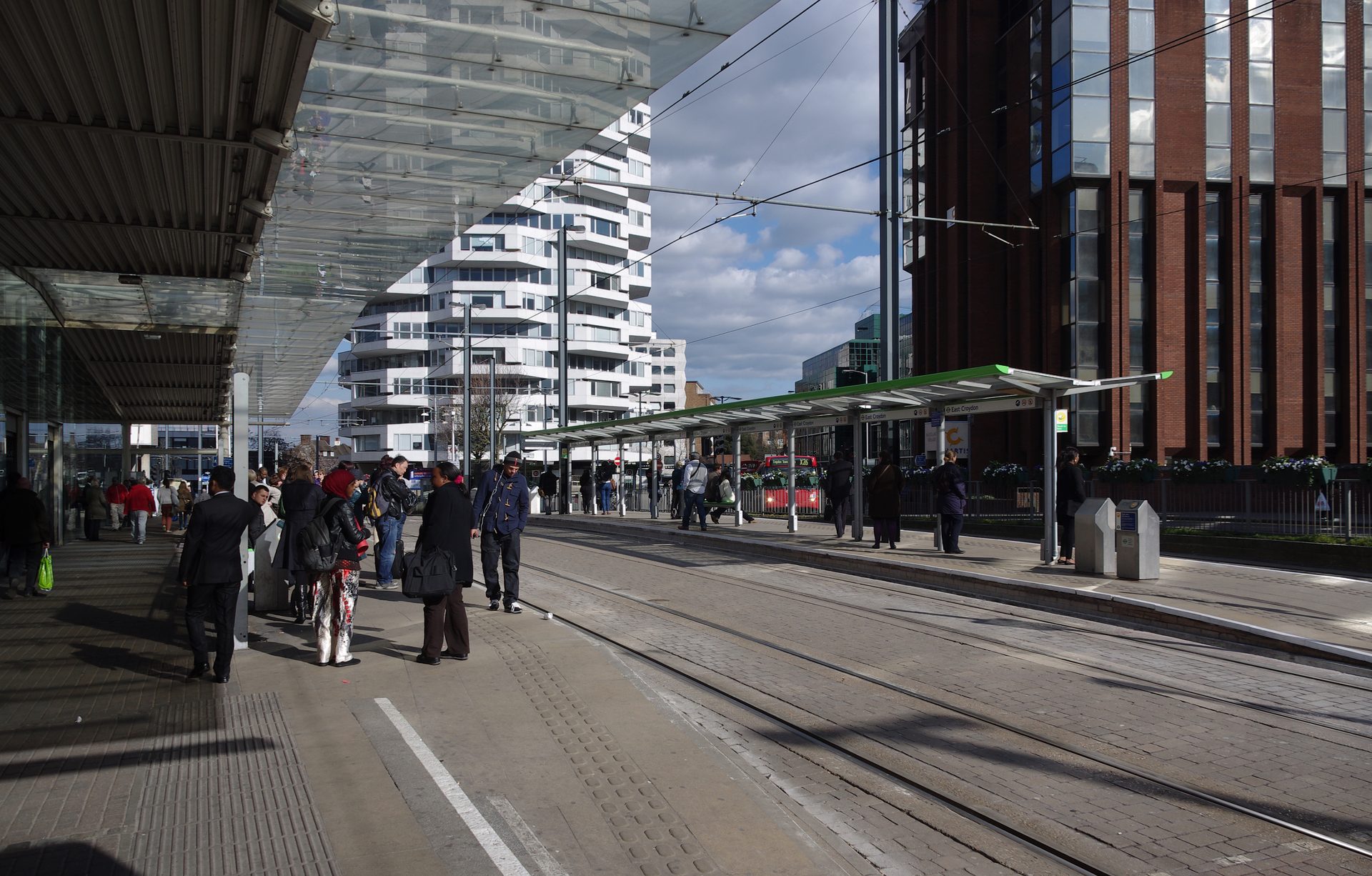 Tram platforms and modern skyline at East Croydon station
