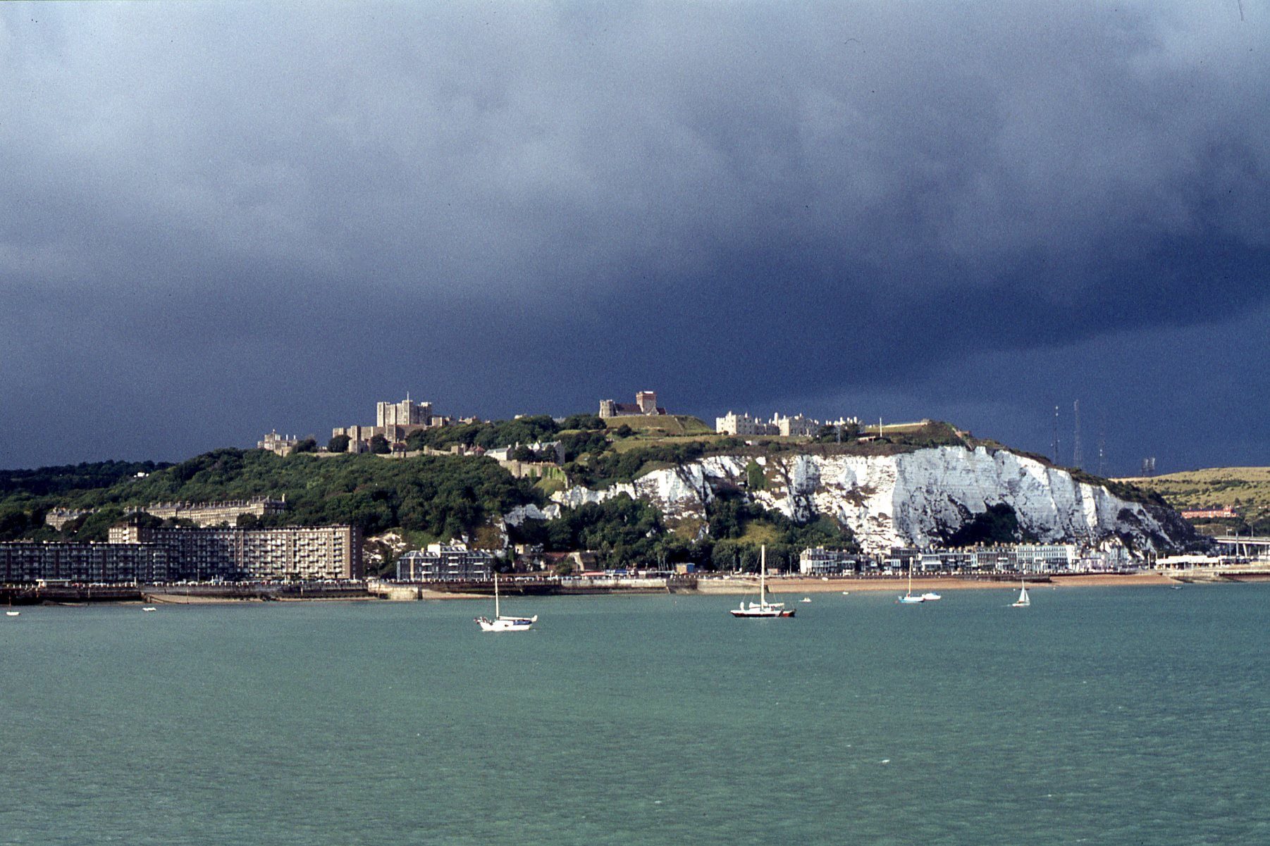 A dramatic sky over Dover Castle and the harbour